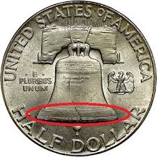 1962 Franklin half dollar Full Bell Lines (FBL) close-up showing complete horizontal lines across Liberty Bell reverse